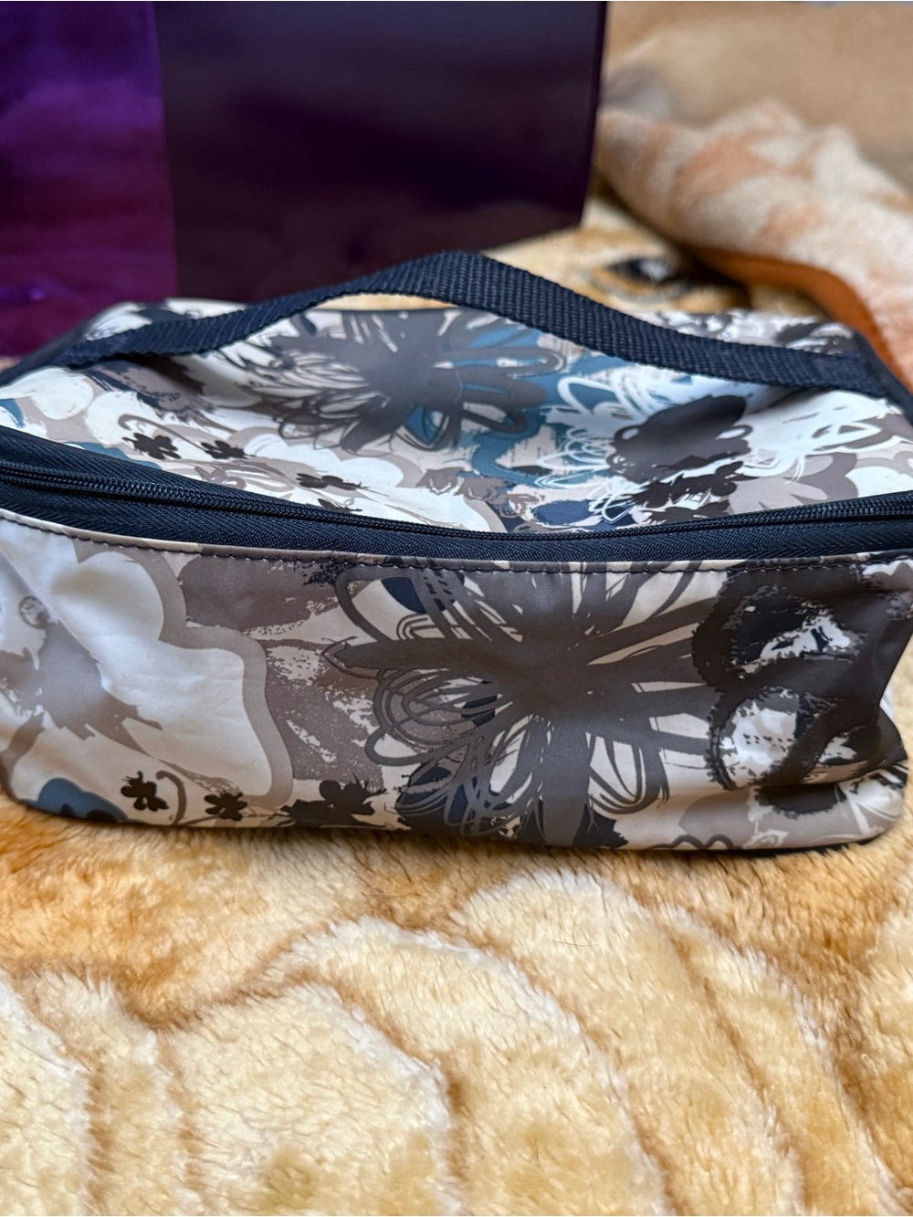 Floral Pattern Cosmetic Travel Case with plastic lining for easy cleanup!